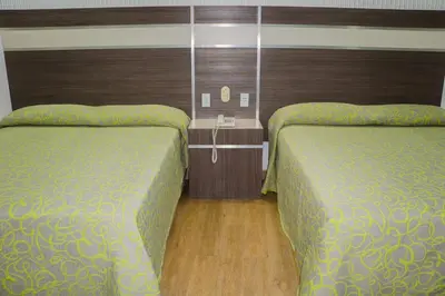 Cama o camas de una habitación en Hotel Castillo