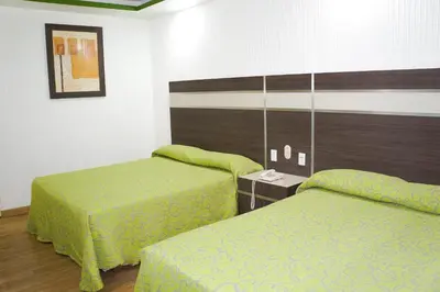 Cama o camas de una habitación en Hotel Castillo