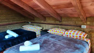 Cama o camas de una habitación en Cabañas Ticomulco