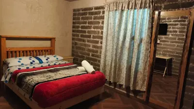 Cama o camas de una habitación en Cabañas Ticomulco