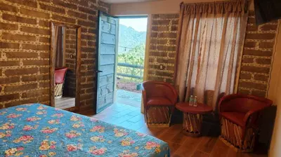 Cama o camas de una habitación en Cabañas Ticomulco