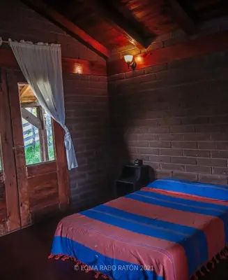 Cama o camas de una habitación en LomaRaboRatón