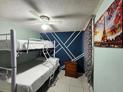 Cama o camas de una habitación en Sensity home C Escolar Departamento hogareño y Calido para familias