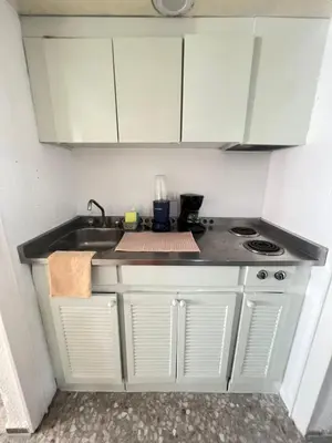 Una cocina o zona de cocina en Suite con acceso a playa y vista espectacular