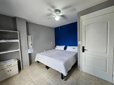 Cama o camas de una habitación en Sensity Home Habitación 5C cómoda y amplia con baño compartido