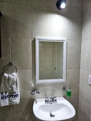 Un baño de Sensity home Departamento 2 Hogareño y confortable