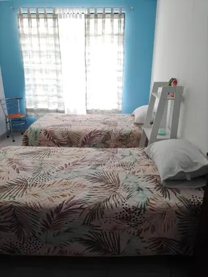 Cama o camas de una habitación en El Rinconcito de Xalapa