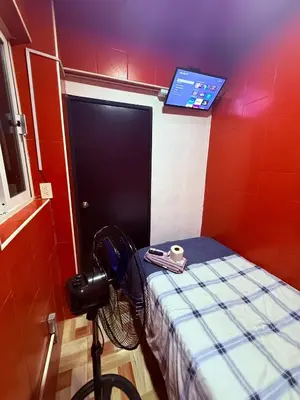 Una televisión o centro de entretenimiento en Airport Benito Juarez Central Bus TAPO