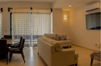 Zona de estar de EOS Suites