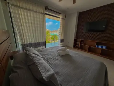Cama o camas de una habitación en EOS Suites