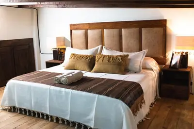 Cama o camas de una habitación en Casa Xolotl, un lugar ancestral