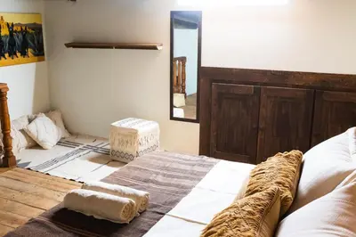 Cama o camas de una habitación en Casa Xolotl, un lugar ancestral