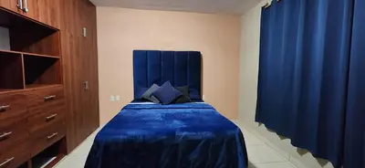 Cama o camas de una habitación en Casa amplia cerca del centro
