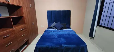 Cama o camas de una habitación en Casa amplia cerca del centro