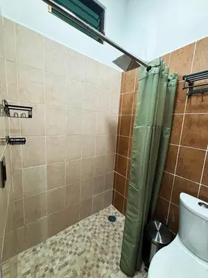 Un baño de Departamento Fila