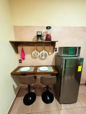 Una cocina o zona de cocina en Departamento Fila
