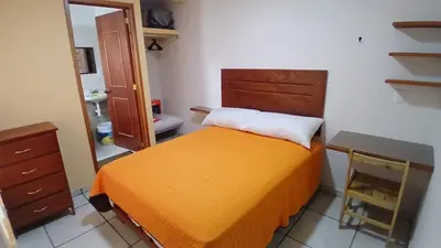 Cama o camas de una habitación en Posada 