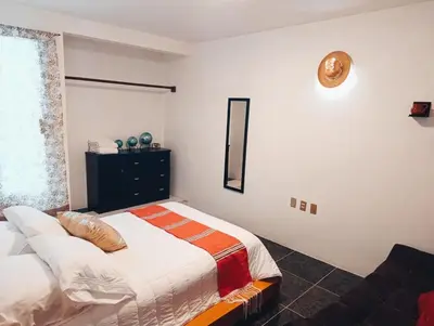 Cama o camas de una habitación en Hogar Díaz, Tradición y Confort en el Centro, 2BR