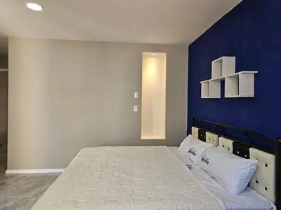 Cama o camas de una habitación en El Riego Casa amplia, moderna y luminosa