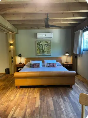 Cama o camas de una habitación en Suites Puerto Escondido KINEKI