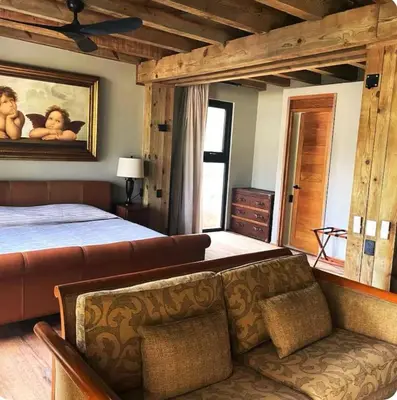 Cama o camas de una habitación en Suites Puerto Escondido KINEKI