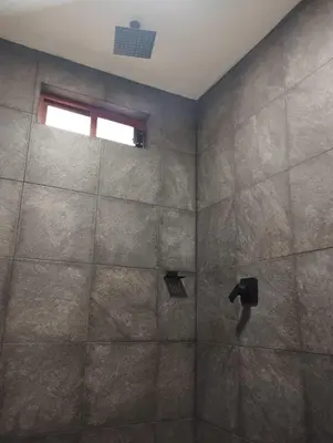 Un baño de Hermosa casita en el centro de Tlatlauquitepec Pueblo Magico