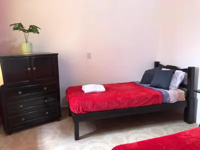 Cama o camas de una habitación en Posda Puesta del Sol