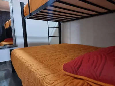 Cama o camas de una habitación en Hostal K & A