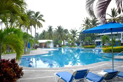 Piscina en o cerca de Departamento Mayan Lakes T6 - Albercas, club de playa, tenis, pádel y más