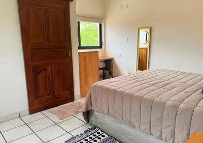 Cama o camas de una habitación en Sunset Suites