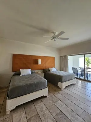 Cama o camas de una habitación en Beautiful Condo in Huatulco
