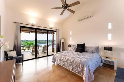 Cama o camas de una habitación en 1007 -- Casa Buena Vida