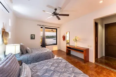 Cama o camas de una habitación en 1007 -- Casa Buena Vida