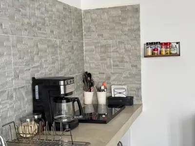 Una cocina o zona de cocina en Your Cozy Corner in Oaxaca with AC