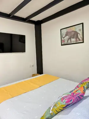 Cama o camas de una habitación en Your Cozy Corner in Oaxaca with AC