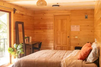 Cama o camas de una habitación en San José del Pacífico- Cabañas Camino al Cielo 2