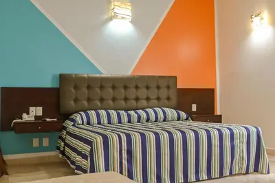 Cama o camas de una habitación en Posada Doña Angela
