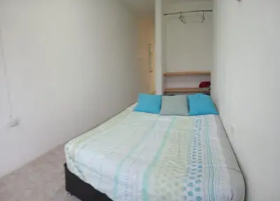 Cama o camas de una habitación en Depto Zona UV Lagos Isleta 102