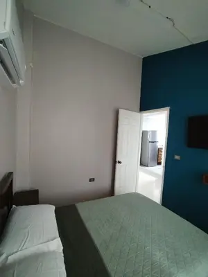 Cama o camas de una habitación en La colina