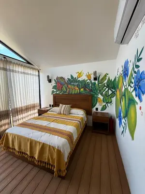 Cama o camas de una habitación en Cabañas Raíces del Cielo