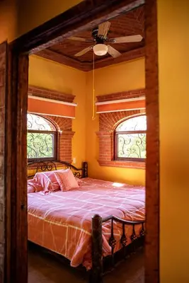 Cama o camas de una habitación en Escápate a una quinta con alberca, asador y diversión en familia