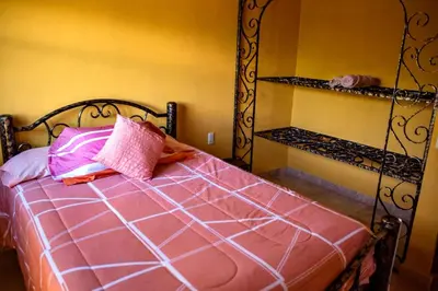Cama o camas de una habitación en Escápate a una quinta con alberca, asador y diversión en familia