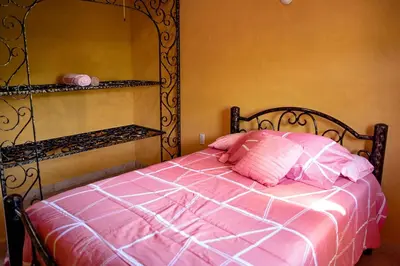 Cama o camas de una habitación en Escápate a una quinta con alberca, asador y diversión en familia