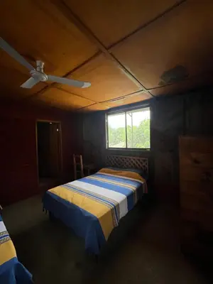 Cama o camas de una habitación en Cabañas LOS REYES