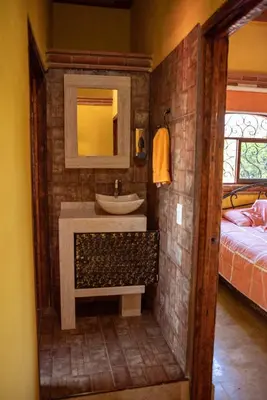 Cama o camas de una habitación en Escápate a una quinta con alberca, asador y diversión en familia