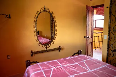 Cama o camas de una habitación en Escápate a una quinta con alberca, asador y diversión en familia
