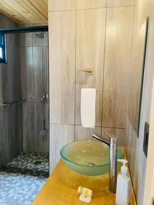 Un baño de Hotel Boutique y Cabañas Alto de la Sierra