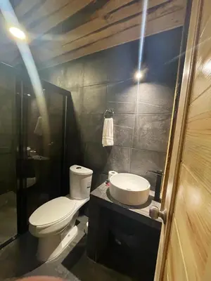 Un baño de Hotel Boutique y Cabañas Alto de la Sierra