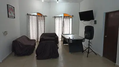 Una televisión o centro de entretenimiento en Real Campestre La Antigua