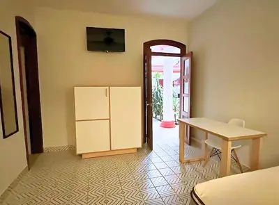 Una televisión o centro de entretenimiento en Habitación en el centro de Xalapa